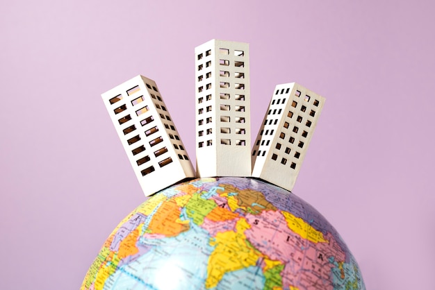 Free photo paper style earth globe with buildings