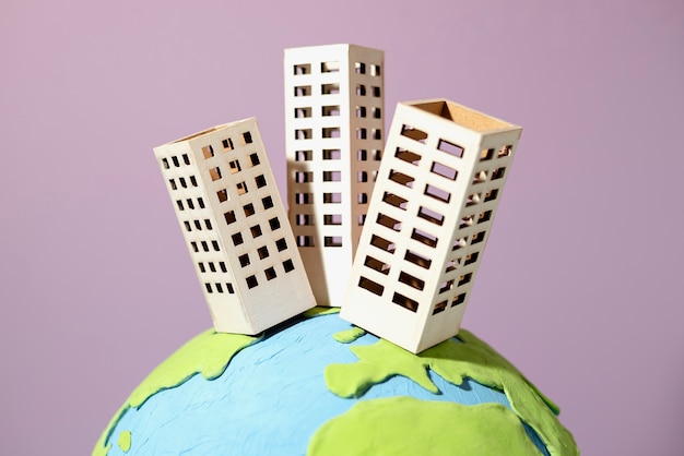 Paper style earth globe with buildings