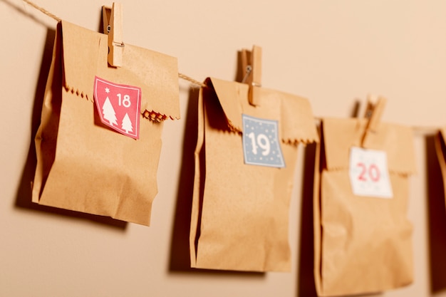 Paper style pouches hanged with hooks on wall