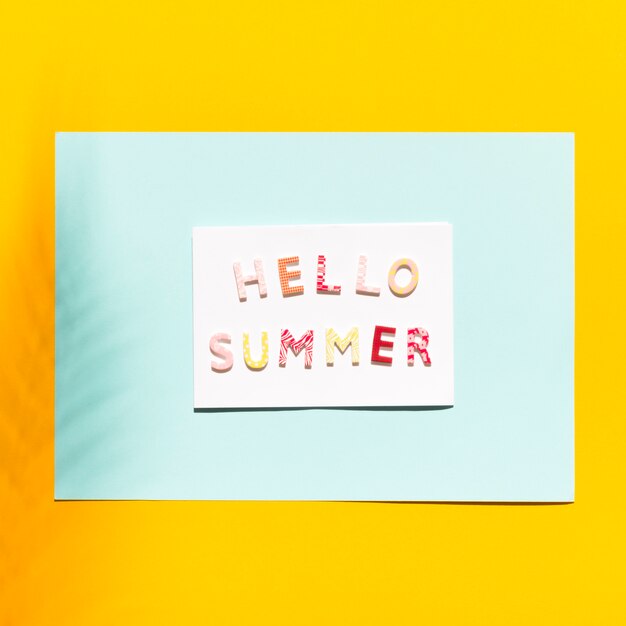 Paper with inscription on Hello Summer