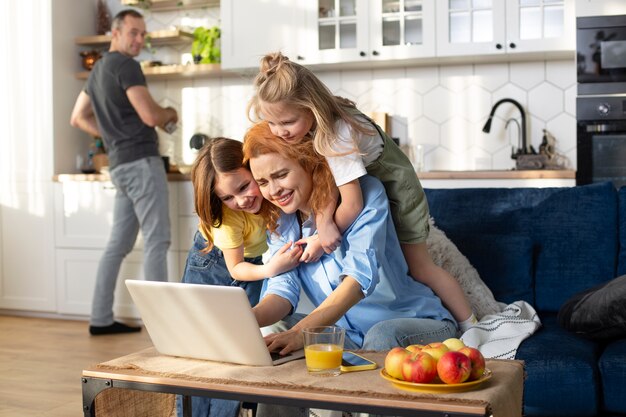 Parent trying to work from home surrounded by kids