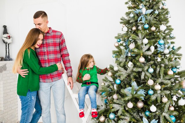 Parents and daughter at christmas