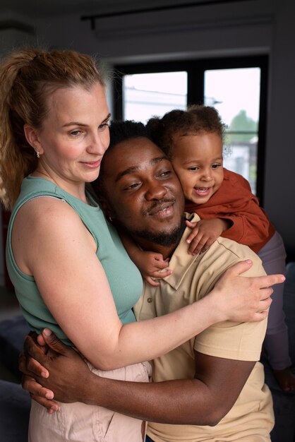 Parents spending time with their black baby