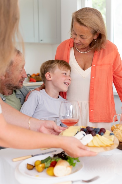 Parents spending time with their daughter and grandson