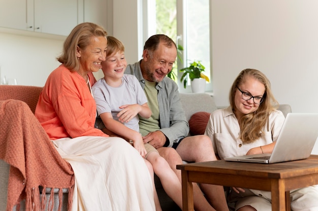 Parents spending time with their daughter and grandson