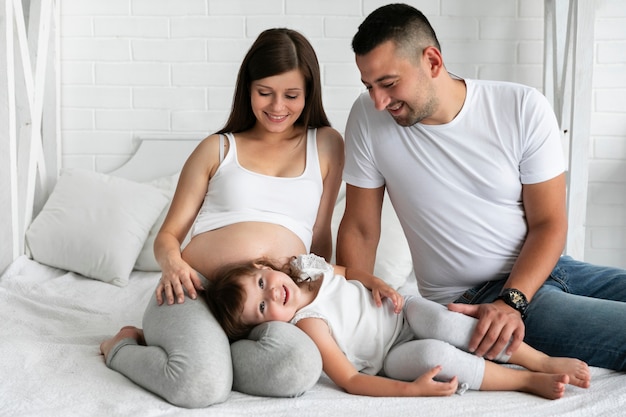 Parents spending time with their daughter 