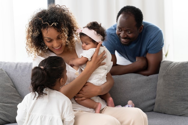 Parents spending time with their little daughters