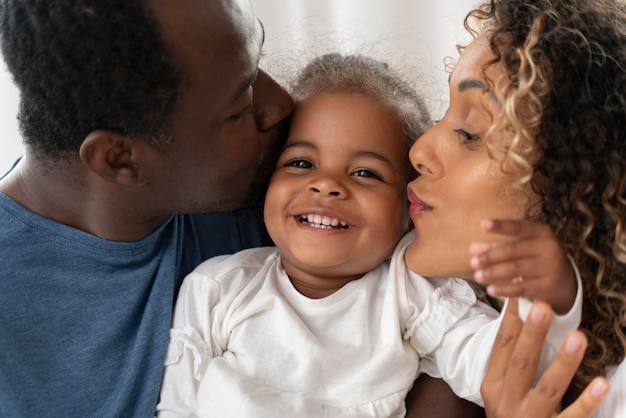 Parents spending time with their little girl