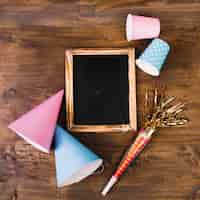 Free photo party supplies and blackboard composition