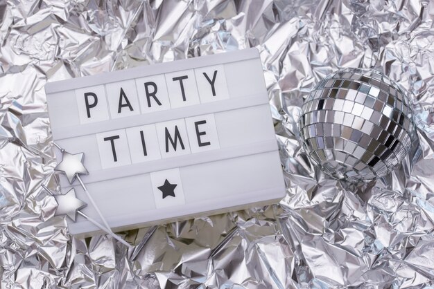 Party time message on lightbox arrangement