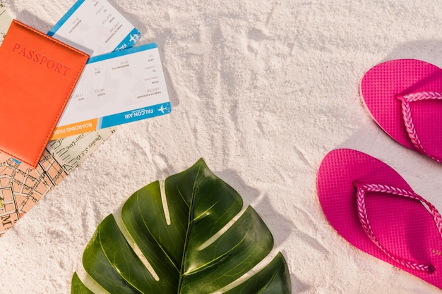 Passport and flip flops for beach vacation