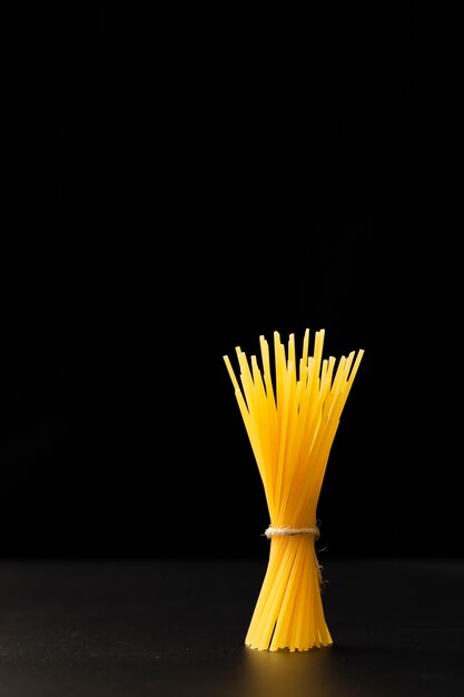 Pasta bond on a dark background