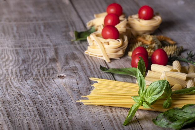 Pasta ingredients on a wooden surface