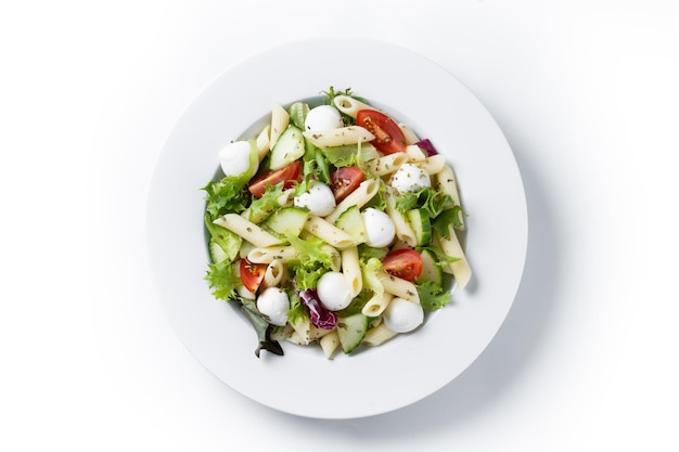 Pasta salad with vegetables and mozzarella cheese isolated on white background