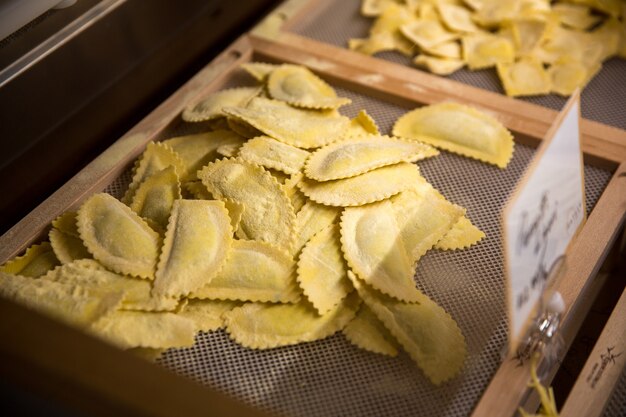 Pasta on a tray in a shop