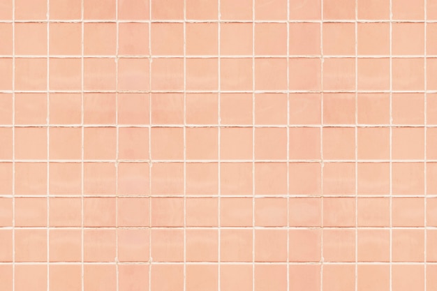 Free photo pastel peach tiles textured background