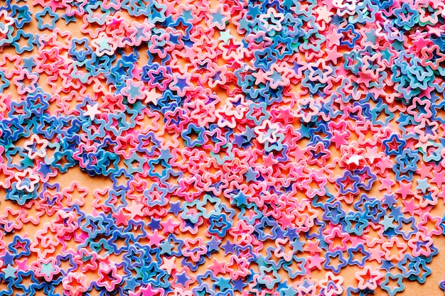 Pastel star sequin abstract background