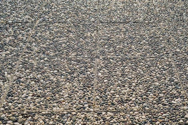 Free Photo the path is paved with paving slabs made of natural stone selective focus on paving slabs idea for the background and decoration of urban spaces