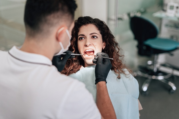 Free Photo patient at dentist office having a check-up