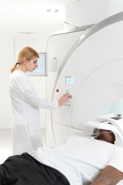 Free Photo patient getting ct scan medium shot