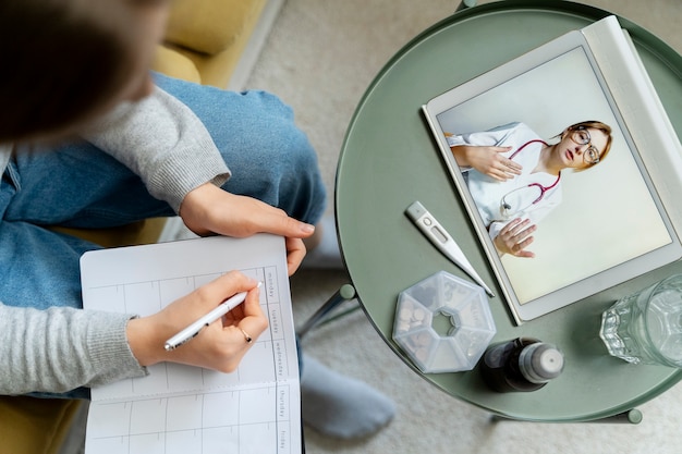 Free Photo patient having teleconsultation with doctor