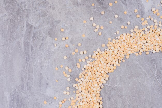 Pea beans isolated on marble surface