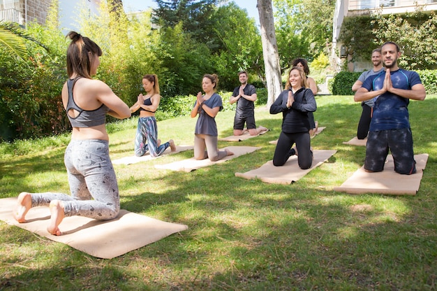 Free photo peaceful people enjoying yoga practice