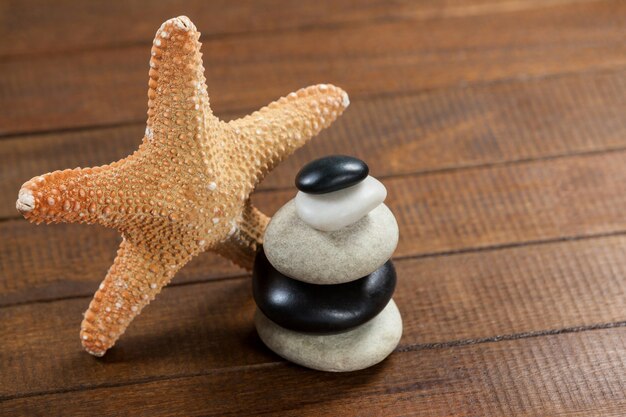 Pebble stones with star fish