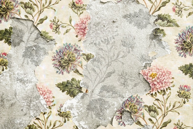 Free Photo peeling floral wallpaper on concrete wall