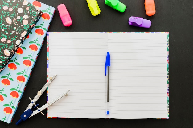 Pen with white paper on school desk