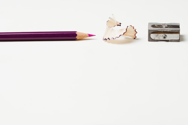 Free photo pencil with pencil shavings and sharpener