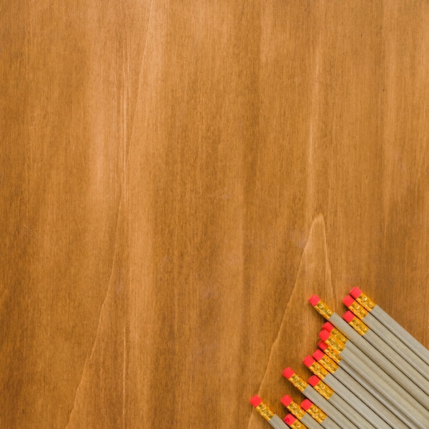 Free photo pencils on wooden desk