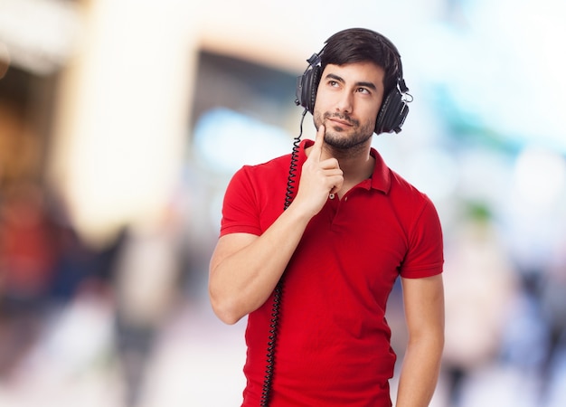 Pensive boy listening to music