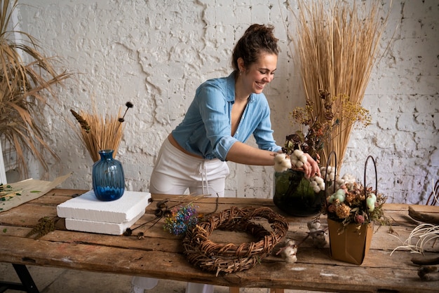 Free Photo people building their own dried arrangement