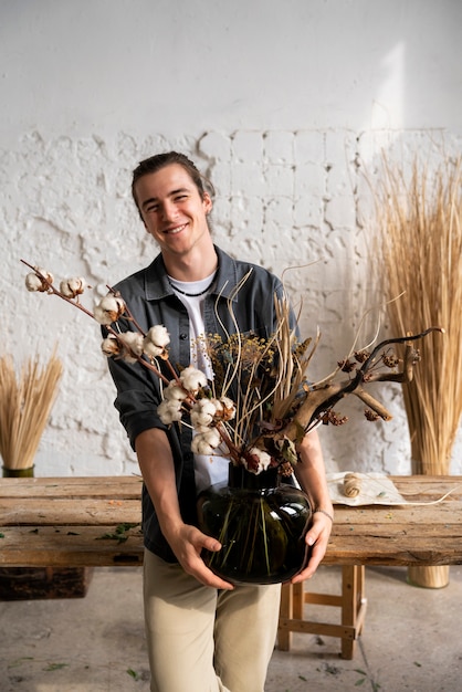 Free Photo people building their own dried arrangement