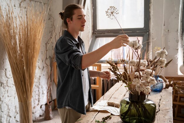 People building their own dried arrangement