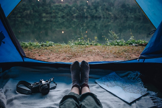 Free photo people camping by the river