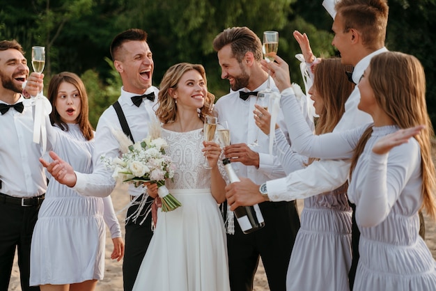 People celebrating a wedding on the beach