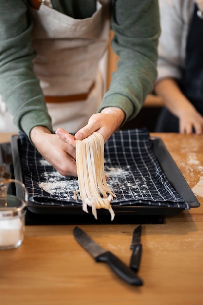 Free photo people cooking and enjoying food