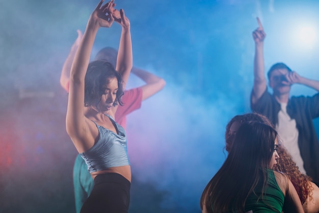 Free photo people dancing and twerking at an indoor party