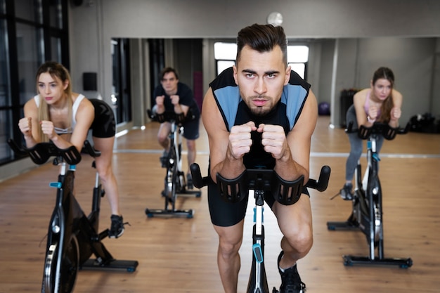 People doing indoor cycling