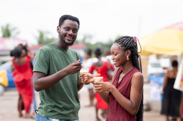 People eating a cold beverage