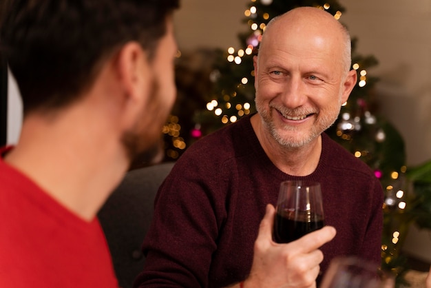 People enjoying a festive christmas dinner