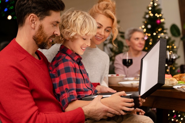 People enjoying a festive christmas dinner