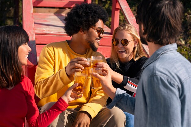 People enjoying guarana drink outdoors