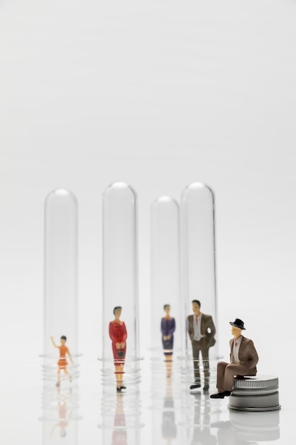 Free Photo people in glass tubes during the pandemic for prevention