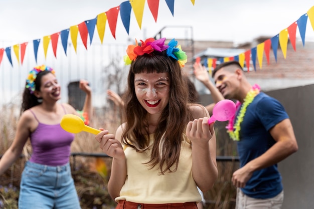 People having fun and celebrating carnival