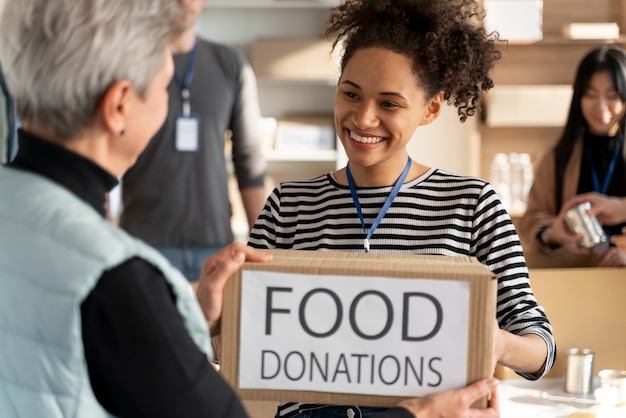 People holding food donations close up