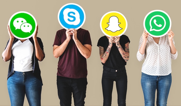 People holding icons of digital brands