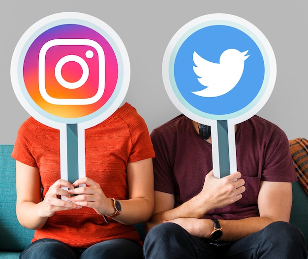 Free Photo people holding social media icons